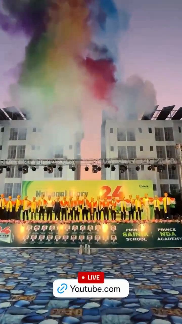 Coloured smoke jets at an inauguration entry